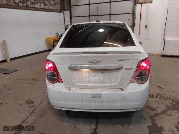 2015 Chevrolet Sonic LTZ with VIN 1G1JE5SB7F4121961, listed as a IAAI auction lot 41310464 with NaN miles. Bid and sale history available at carsss.com. Image 16.