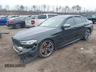 2022 BMW 5 Series M550i xDrive z VIN WBA13BK01NCH76521, wystawiony jako IAAI lot #41904437 z przebiegiem Nie podano mil oraz . Historia ofert i sprzedaży dostępna na DreamBid. Obrazek 21.