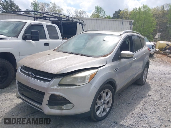 2015 Ford Escape Titanium with VIN 1FMCU0J98FUA87044, listed as a IAAI auction lot 41952096 with 257,437 mi miles. Bid and sale history available at carsss.com. Image 2.