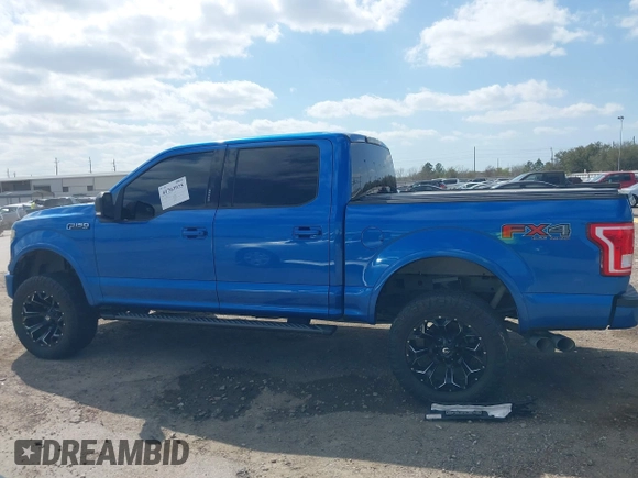 2015 Ford F-150 XLT with VIN 1FTEW1EF8FKD15133, listed as a IAAI auction lot 41763935 with 139,721 mi miles. Bid and sale history available at carsss.com. Image 15.