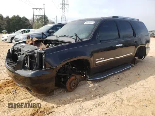 2011 GMC Yukon Denali with VIN 1GKS2EEF3BR137742, listed as a Copart auction lot 48998205 with Not Provided miles and Salvage Title. Bid and sale history available at DreamBid. Image 1.