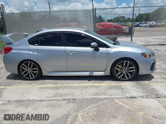 2021 Subaru WRX STI with VIN JF1VA2E66M9822014, listed as a IAAI auction lot 42499316 with 55,625 mi miles and . Bid and sale history available at DreamBid. Image 13.