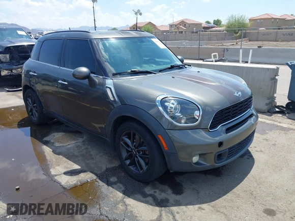 2014 MINI Countryman S with VIN WMWZC3C59EWP29137, listed as a IAAI auction lot 42661922 with 128,064 mi miles and . Bid and sale history available at DreamBid. Image 1.
