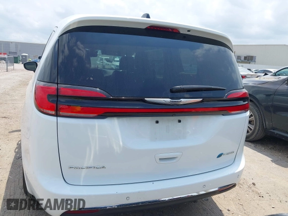 2023 Chrysler Pacifica Hybrid Touring L z VIN 2C4RC1L76PR618422, wystawiony jako IAAI lot #42289283 z przebiegiem 40 744 mil mil oraz . Historia ofert i sprzedaży dostępna na DreamBid. Obrazek 16.