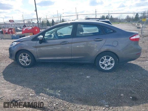 2014 Ford Fiesta SE with VIN 3FADP4BJ1EM199936, listed as a IAAI auction lot 41988670 with 44,846 mi miles and . Bid and sale history available at DreamBid. Image 14.