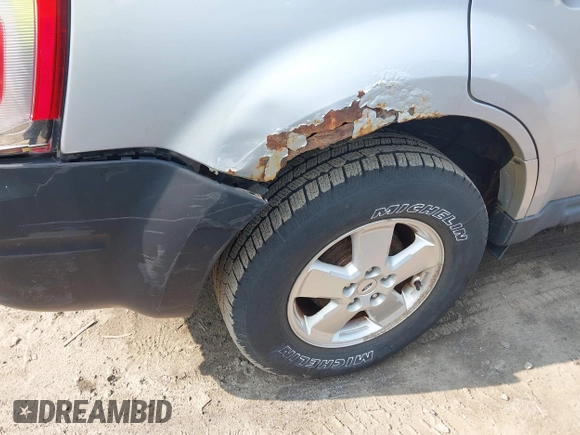 2012 Ford Escape XLT z VIN 1FMCU9DG6CKC70903, wystawiony jako IAAI lot #42425781 z przebiegiem 196 762 mil mil oraz . Historia ofert i sprzedaży dostępna na DreamBid. Obrazek 13.