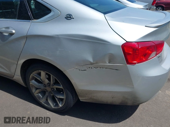 2017 Chevrolet Impala LT with VIN 2G1105S31H9197165, listed as a IAAI auction lot 42303730 with 232,046 mi miles and . Bid and sale history available at DreamBid. Image 6.