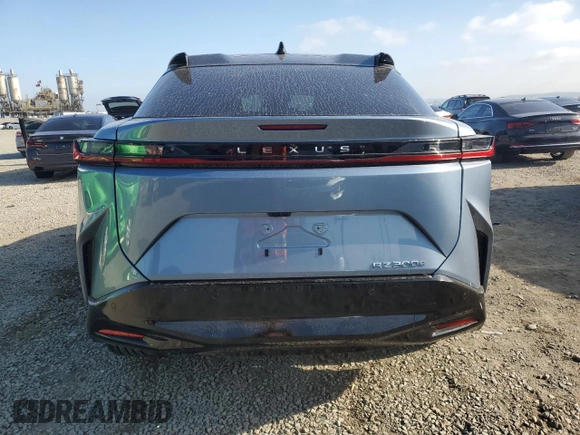 2024 Lexus RZ 300e Premium с VIN JTJABABB2RA003229, выставлен на аукционе Copart как лот 55311235 с пробегом 2 759 миль миль и Списание • Salvage title. История ставок и продаж доступна на DreamBid. Изображение 6.