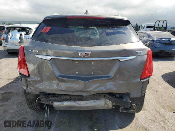 2019 Cadillac XT5 FWD with VIN 1GYKNARS8KZ236067, listed as a Copart auction lot 50551375 with 64,840 mi miles and Salvage Title. Bid and sale history available at carsss.com. Image 6.