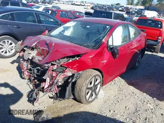 2016 Toyota Prius Four with VIN JTDKARFU3G3526524, listed as a IAAI auction lot 41798589 with 115,956 mi miles and . Bid and sale history available at DreamBid. Image 2.