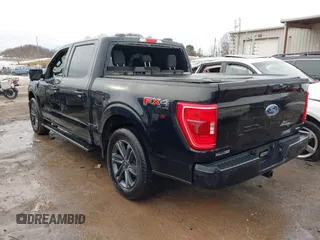 2023 Ford F-150 XL with VIN 1FTFW1E81PFD03857, listed as a IAAI auction lot 41338585 with 9,195 mi miles. Bid and sale history available at carsss.com. Image 3.