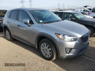 2013 Mazda CX-5 Touring with VIN JM3KE4CE6D0127888, listed as a Copart auction lot 49294035 with 136,048 mi miles and Salvage Title. Bid and sale history available at DreamBid. Image 4.