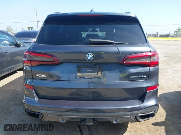 2022 BMW X5 xDrive45e with VIN 5UXTA6C07N9J29881, listed as a IAAI auction lot 42086373 with 63,510 mi miles and . Bid and sale history available at DreamBid. Image 16.