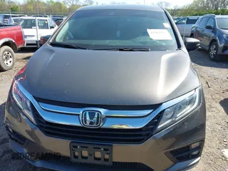 2019 Honda Odyssey EX-L with VIN 5FNRL6H78KB115260, listed as a IAAI auction lot 41962095 with 146,658 mi miles and . Bid and sale history available at DreamBid. Image 12.