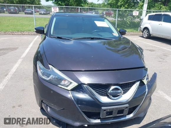 2016 Nissan Maxima SL with VIN 1N4AA6AP5GC393122, listed as a IAAI auction lot 42523884 with 116,659 mi miles and . Bid and sale history available at DreamBid. Image 12.