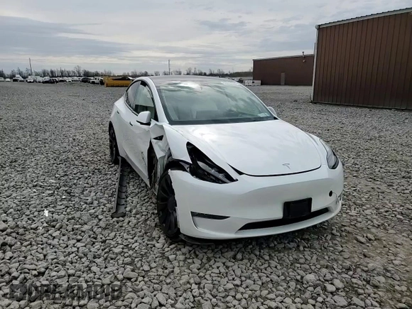 2023 Tesla Model Y Performance z VIN 7SAYGDEF6PF798103, wystawiony jako Copart lot #53607895 z przebiegiem 22 334 mil mil oraz Szkoda całkowita • Salvage title. Historia ofert i sprzedaży dostępna na DreamBid. Obrazek 14.