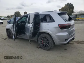 2017 Jeep Grand Cherokee SRT with VIN 1C4RJFDJ8HC663059, listed as a Copart auction lot 45677045 with 88,914 mi miles and Salvage Title. Bid and sale history available at carsss.com. Image 2.