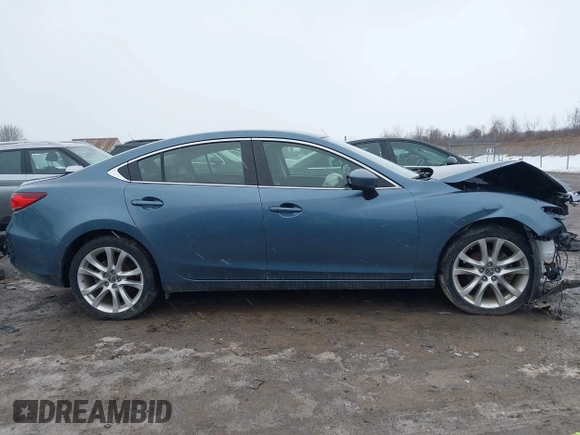 2014 Mazda 6 i Touring with VIN JM1GJ1T53E1112768, listed as a IAAI auction lot 41727440 with 166,081 mi miles and . Bid and sale history available at DreamBid. Image 14.