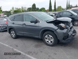 2014 Honda CR-V LX with VIN 3CZRM3H32EG715290, listed as a IAAI auction lot 42178372 with 90,934 mi miles and . Bid and sale history available at carsss.com. Image 13.