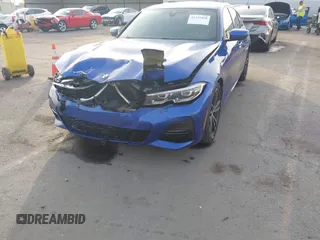 2019 BMW 3 Series 330i xDrive with VIN WBA5R7C50KAE82705, listed as a IAAI auction lot 41233898 with 69,505 mi miles. Bid and sale history available at carsss.com. Image 6.