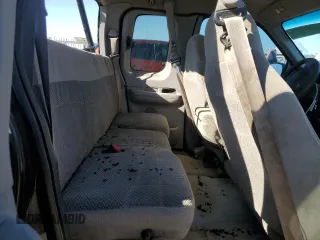 1999 Ford F-150 с VIN 2FTZX1729XCA25031, выставлен на аукционе Copart как лот 46941615 с пробегом 310 800 миль миль и Списание • Salvage title. История ставок и продаж доступна на DreamBid. Изображение 10.