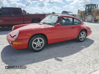 1992 Porsche 911 with VIN WP0AB2964NS420096, listed as a Copart auction lot 77239484 with Not provided miles and Salvage title. Bid and sale history available at DreamBid. Image 1.