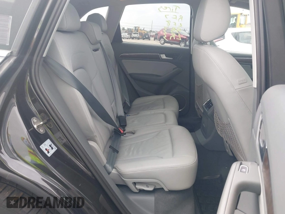 2015 Audi Q5 Premium Plus z VIN WA1LFAFP7FA078648, wystawiony jako IAAI lot #42458743 z przebiegiem 108 057 mil mil oraz . Historia ofert i sprzedaży dostępna na DreamBid. Obrazek 8.
