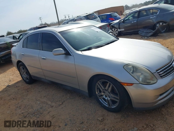 2003 Infiniti G35 z VIN JNKCV51E53M334588, wystawiony jako IAAI lot #41795156 z przebiegiem 99 906 mil mil oraz . Historia ofert i sprzedaży dostępna na DreamBid. Obrazek 13.