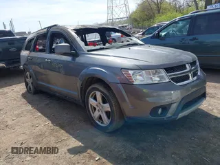 2012 Dodge Journey SXT z VIN 3C4PDDBG3CT297633, wystawiony jako IAAI lot #42056704 z przebiegiem 188 000 mil mil oraz . Historia ofert i sprzedaży dostępna na DreamBid. Obrazek 1.