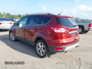 2014 Ford Escape Titanium with VIN 1FMCU0JX7EUB96463, listed as a IAAI auction lot 41935190 with 67,098 mi miles. Bid and sale history available at carsss.com. Image 3.