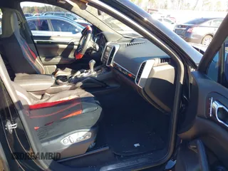 2016 Porsche Cayenne with VIN WP1AA2A21GLA02456, listed as a IAAI auction lot 41309026 with 136,266 mi miles. Bid and sale history available at carsss.com. Image 5.