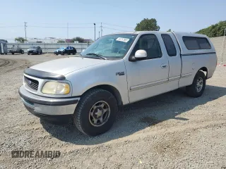 1997 Ford F-150 with VIN 1FTDX1763VND32389, listed as a Copart auction lot 64757565 with 172,493 mi miles and Salvage title. Bid and sale history available at DreamBid. Image 1.