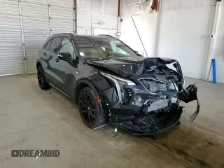 2023 Cadillac XT4 AWD Sport z VIN 1GYFZFR41PF103650, wystawiony jako Copart lot #59321355 z przebiegiem 27 092 mil mil oraz Szkoda całkowita • Salvage title. Historia ofert i sprzedaży dostępna na DreamBid. Obrazek 13.
