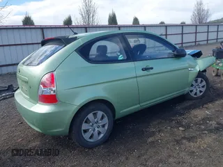 2008 Hyundai Accent GS with VIN KMHCM36C28U064545, listed as a IAAI auction lot 41958102 with 120,679 mi miles. Bid and sale history available at carsss.com. Image 4.
