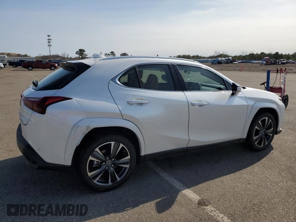 2025 Lexus UX with VIN JTHUCJDH6S2007491, listed as a Copart auction lot 52997175 with 1,042 mi miles and Salvage Title. Bid and sale history available at carsss.com. Image 3.
