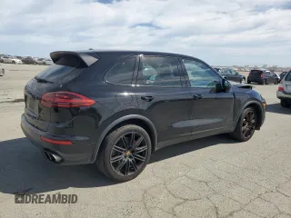 2017 Porsche Cayenne Turbo with VIN WP1AC2A2XHLA92055, listed as a Copart auction lot 52610555 with 82,224 mi miles and Salvage title. Bid and sale history available at DreamBid. Image 3.