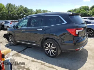 2022 Honda Pilot Touring 7-Passenger with VIN 5FNYF6H62NB057161, listed as a Copart auction lot 56423864 with 0 mi miles and Salvage Title. Bid and sale history available at carsss.com. Image 2.