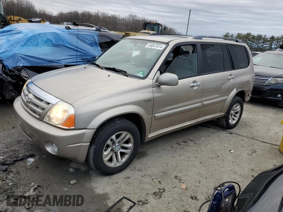 2004 Suzuki XL7 LX z VIN JS3TX92V744100442, wystawiony jako Copart lot #84847614 z przebiegiem 82 751 mil mil oraz Szkody całkowita. Historia ofert i sprzedaży dostępna na DreamBid. Obrazek 1.