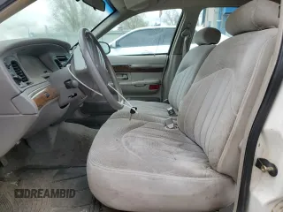 1999 Mercury Grand Marquis GS z VIN 2MEFM74W0XX670924, wystawiony jako Copart lot #51811055 z przebiegiem 176 559 mil mil oraz Szkoda całkowita • Salvage title. Historia ofert i sprzedaży dostępna na DreamBid. Obrazek 7.
