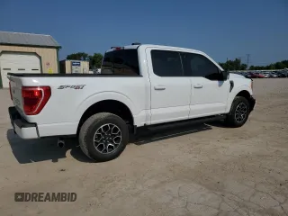 2023 Ford F-150 XL with VIN 1FTFW1E81PFA70563, listed as a Copart auction lot 60440685 with 31,198 mi miles and Salvage title. Bid and sale history available at DreamBid. Image 3.