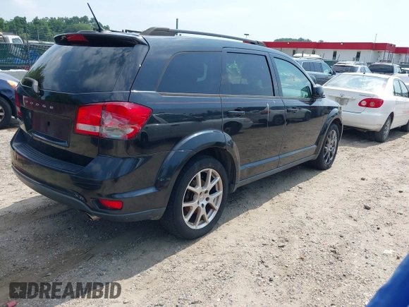 2012 Dodge Journey SXT with VIN 3C4PDDBG3CT144881, listed as a IAAI auction lot 42844117 with 184,804 mi miles and . Bid and sale history available at DreamBid. Image 4.