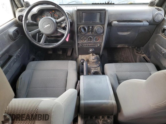 2007 Jeep Wrangler Unlimited Rubicon with VIN 1J4GA69177L100903, listed as a Copart auction lot 81321154 with 130,632 mi miles and Salvage title. Bid and sale history available at DreamBid. Image 8.