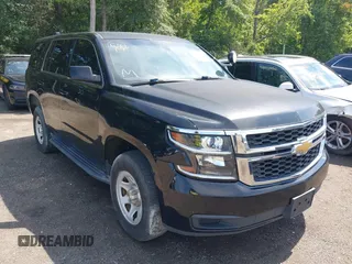 2015 Chevrolet Tahoe Commercial z VIN 1GNSK3EC2FR672807, wystawiony jako IAAI lot #42749143 z przebiegiem 91 176 mil mil oraz . Historia ofert i sprzedaży dostępna na DreamBid. Obrazek 1.