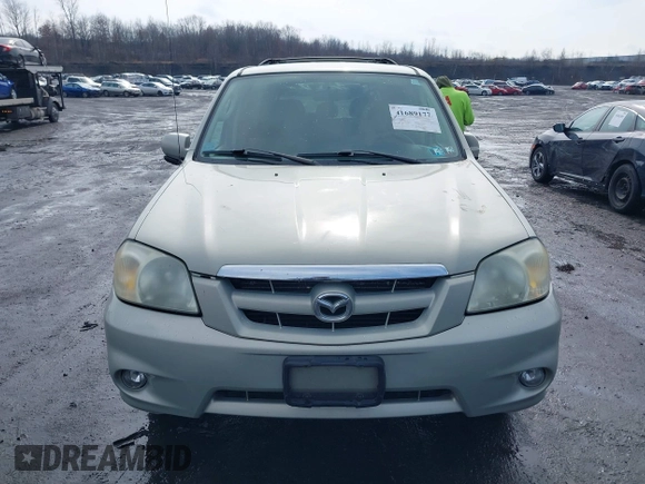2006 Mazda Tribute S with VIN 4F2YZ04136KM15337, listed as a IAAI auction lot 41689177 with 153,720 mi miles and . Bid and sale history available at DreamBid. Image 6.