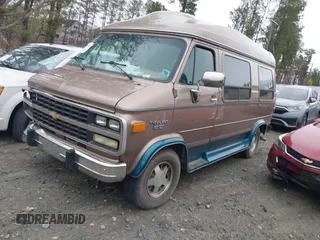 1995 Chevrolet Chevy Van z VIN 1GBEG25K8SF245639, wystawiony jako IAAI lot #41917862 z przebiegiem 89 015 mil mil oraz . Historia ofert i sprzedaży dostępna na DreamBid. Obrazek 17.