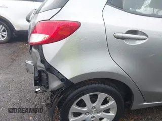 2011 Mazda 2 Sport with VIN JM1DE1HY1B0127409, listed as a IAAI auction lot 42015727 with 154,385 mi miles. Bid and sale history available at carsss.com. Image 16.