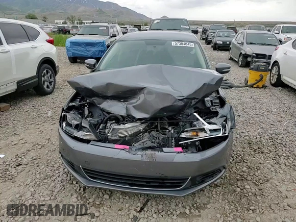 2014 Volkswagen Jetta SE z VIN 3VWD07AJ4EM239120, wystawiony jako Copart lot #57304045 z przebiegiem 183 748 mil mil oraz Szkoda całkowita • Salvage title. Historia ofert i sprzedaży dostępna na DreamBid. Obrazek 13.