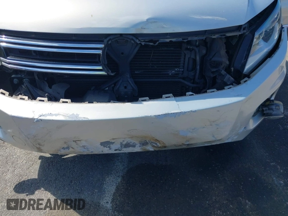 2015 Volkswagen Tiguan SE with VIN WVGAV7AX0FW544218, listed as a IAAI auction lot 41897418 with 97,235 mi miles and . Bid and sale history available at DreamBid. Image 6.