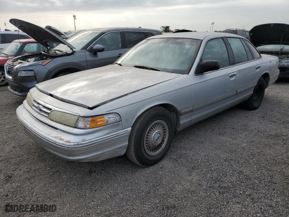 1997 Ford Crown Victoria with VIN 2FALP73W2VX230784, listed as a Copart auction lot 76339234 with 234,792 mi miles and Non Repairable. Bid and sale history available at carsss.com. Image 1.