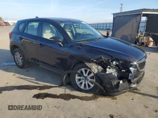 2015 Mazda CX-5 Sport z VIN JM3KE2BE6F0491107, wystawiony jako Copart lot #42462395 z przebiegiem 82 528 mil mil oraz Szkoda całkowita • Salvage title. Historia ofert i sprzedaży dostępna na DreamBid. Obrazek 4.